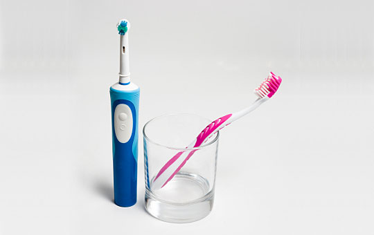 why do electric toothbrushes clean better