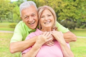 An elderly couple after a dental appointment in Long Beach, CA