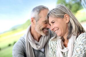 Satisfied couple after a successful dental appointment in Long Beach, CA
