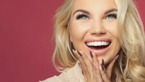 cosmetic dental client showing her smile