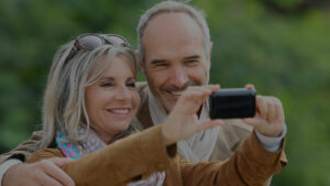 dental implant patients taking selfie together