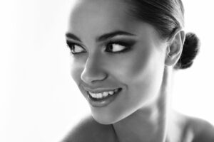 santa monica cosmetic dental client smiling while looking the other way