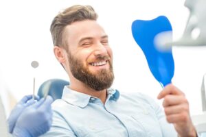 Young man having cosmetic bonding in Long Beach, CA