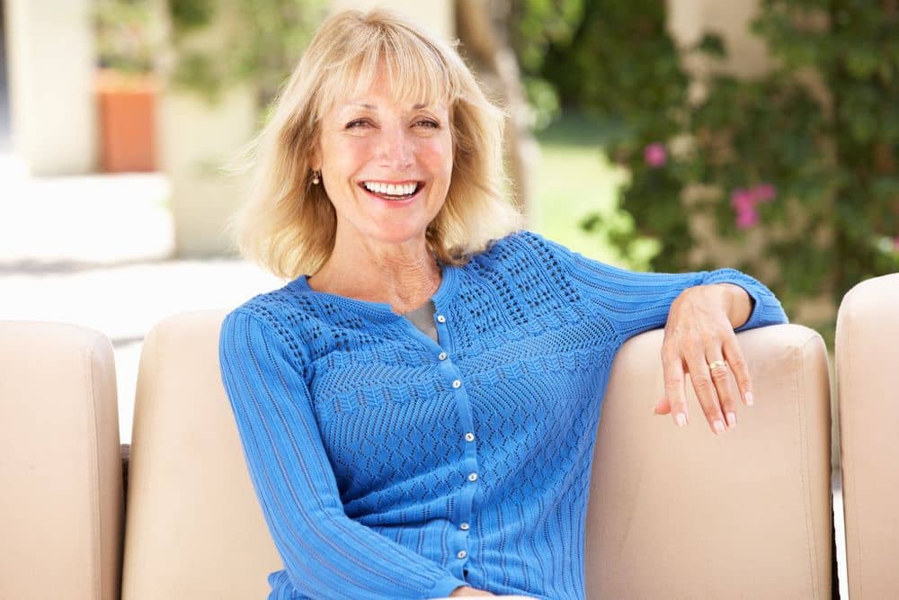 Happy dental patient after a smile makeover in Long Beach, CA