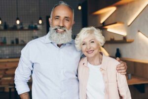 Dental patient satisfied after dental implants procedure in Long Beach, CA