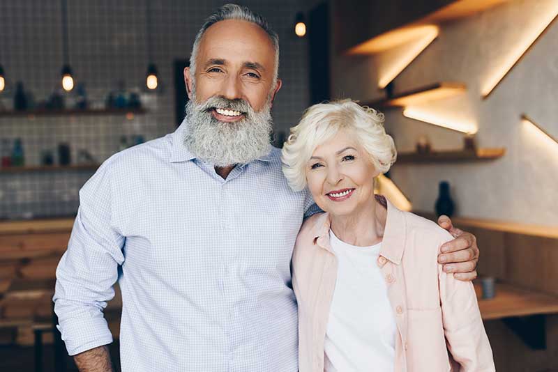 Dental patient satisfied after dental implants procedure in Long Beach, CA