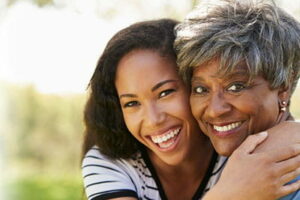 Loving Mother and daughter dental patient at Long Beach, CA